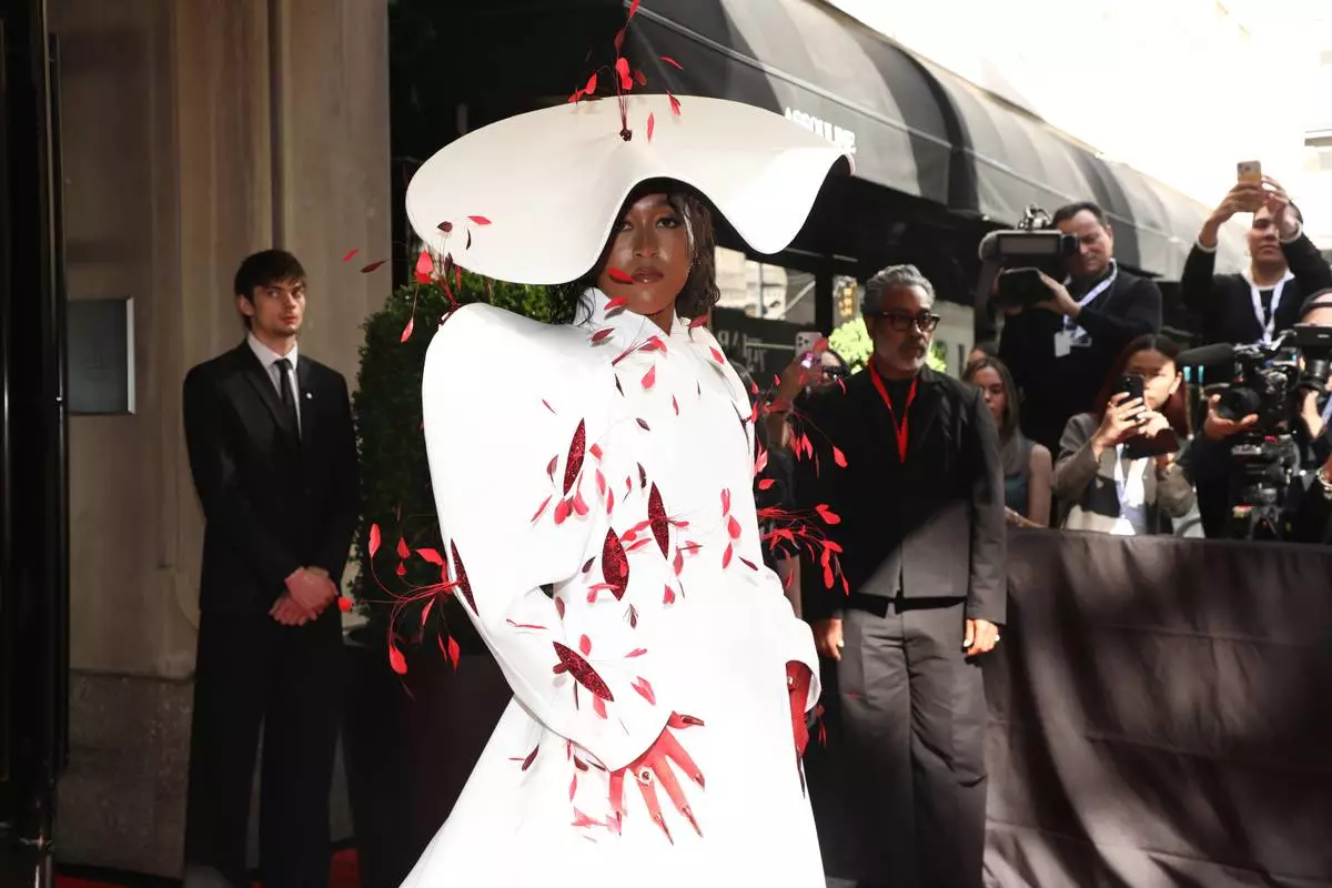Naomi Osaka departs The Mark Hotel prior to attending The Metropolitan Museum of Art's Costume Institute benefit gala celebrating the opening of the "Costume Art" exhibition on Monday, May 4, 2026, in New York. (Photo by Andy Kropa/Invision/AP)