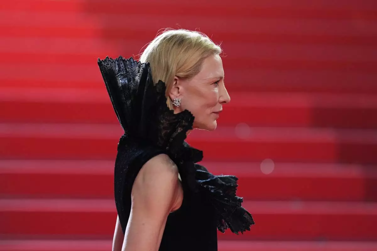 Cate Blanchett poses for photographers upon arrival at the premiere of the film 'Paper Tiger' at the 79th international film festival, Cannes, southern France, Saturday, May 16, 2026. (Photo by Scott A Garfitt/Invision/AP)