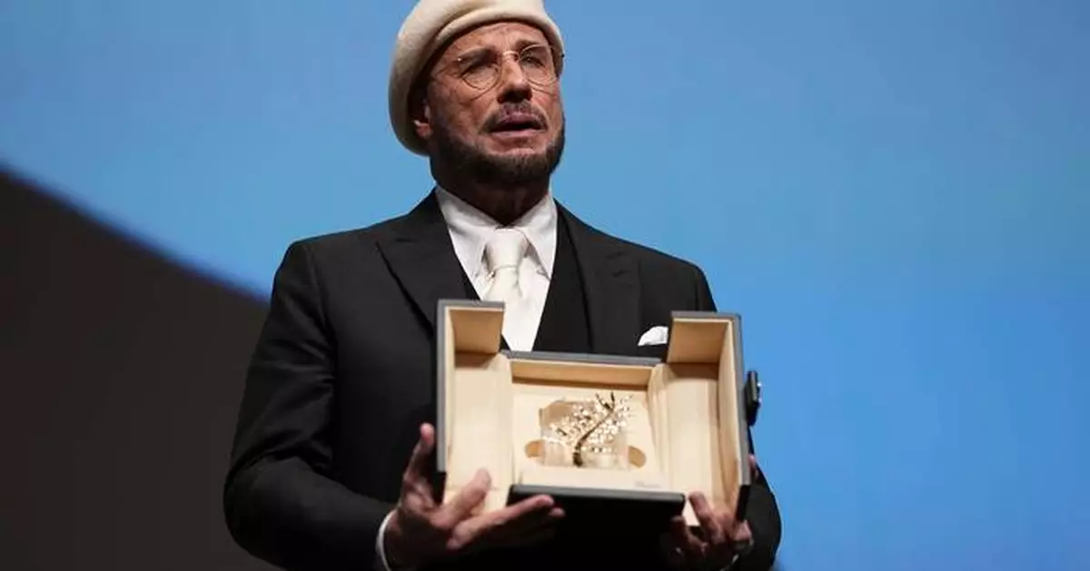 John Travolta surprised with honorary Palme d'Or at Cannes Film Festival
