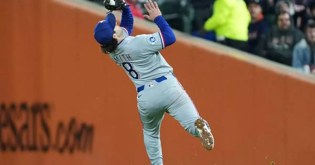 Rangers say second baseman Josh Smith will be hospitalized at least a week with viral meningitis