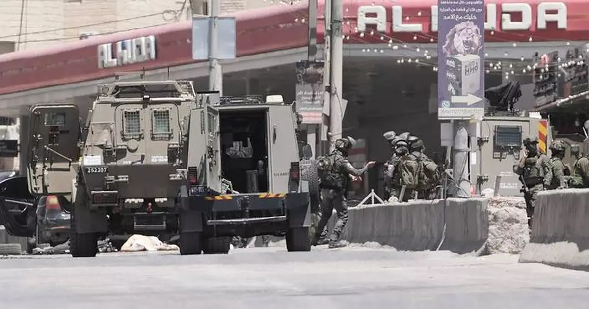 Israel's military said a Palestinian family could bury their father. Then the settlers arrived