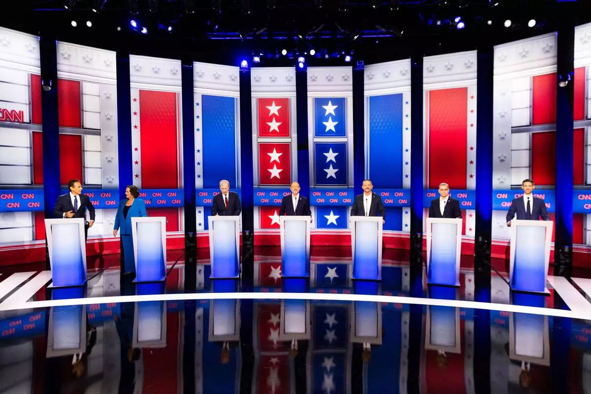 From left to right, Antonio Villaraigosa, Katie Porter, Tom Steyer, Steve Hilton, Chad Bianco, Xavier Becerra and Matt Mahan participate in a California gubernatorial debate hosted by CNN at East Los Angeles College in Monterey Park, Calif. Tuesday, May 5, 2026. (AP Photo/Ethan Swope)