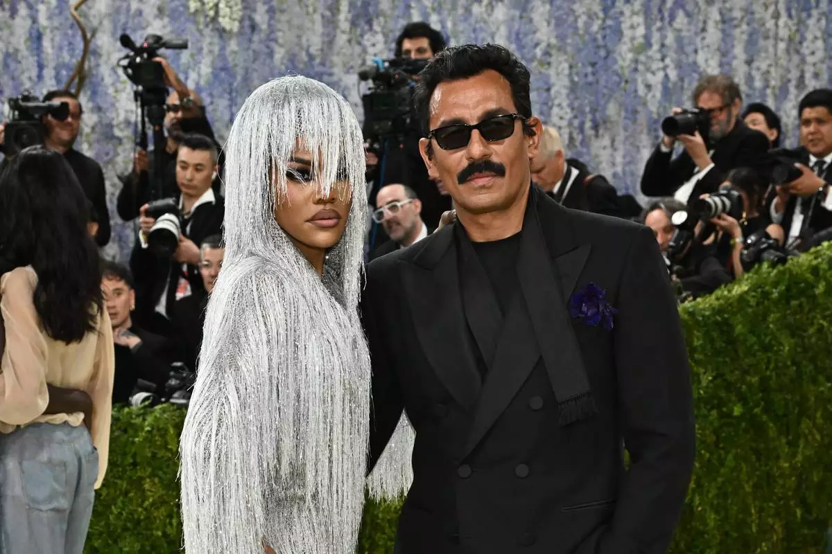 Teyana Taylor, left, and Haider Ackermann arrive at The Metropolitan Museum of Art's Costume Institute benefit gala celebrating the opening of the "Costume Art" exhibition on Monday, May 4, 2026, in New York. (Photo by Evan Agostini/Invision/AP)