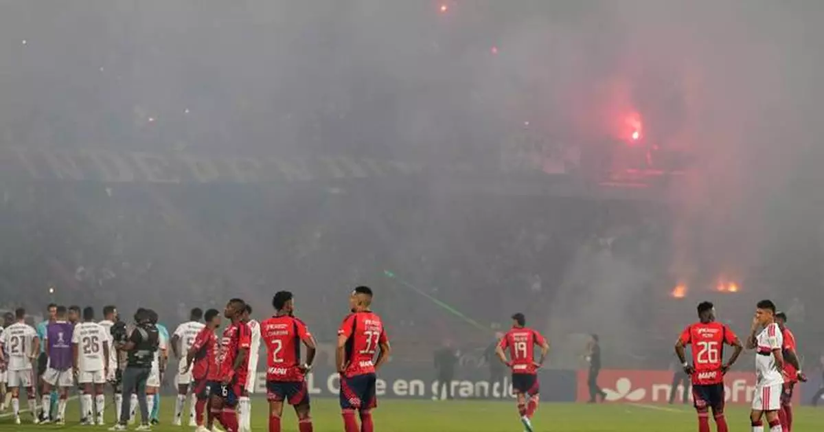 Copa Libertadores soccer match halted after just 3 minutes when fans protest with flares