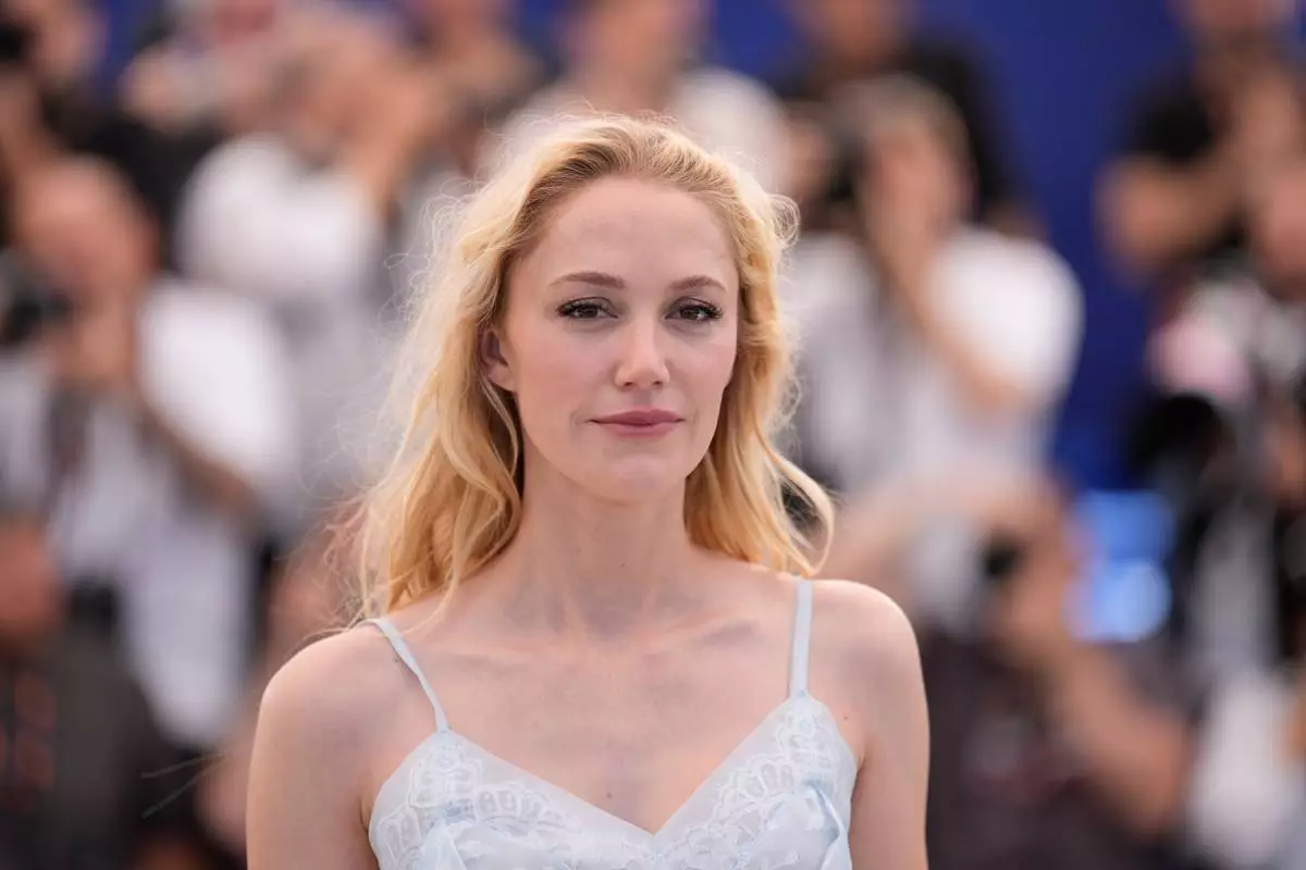 Maika Monroe poses for photographers at the photo call for the film 'Victorian Psycho' during the 79th international film festival, Cannes, southern France, Thursday, May 21, 2026. (AP Photo/John Locher)