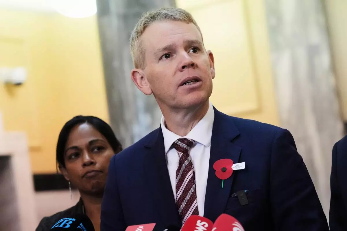 FILE - New Zealand Labour Party leader Chris Hipkins speaks to reporters at Parliament in Wellington, New Zealand, April 23, 2026. (AP Photo/Charlotte Graham-McLay, File)