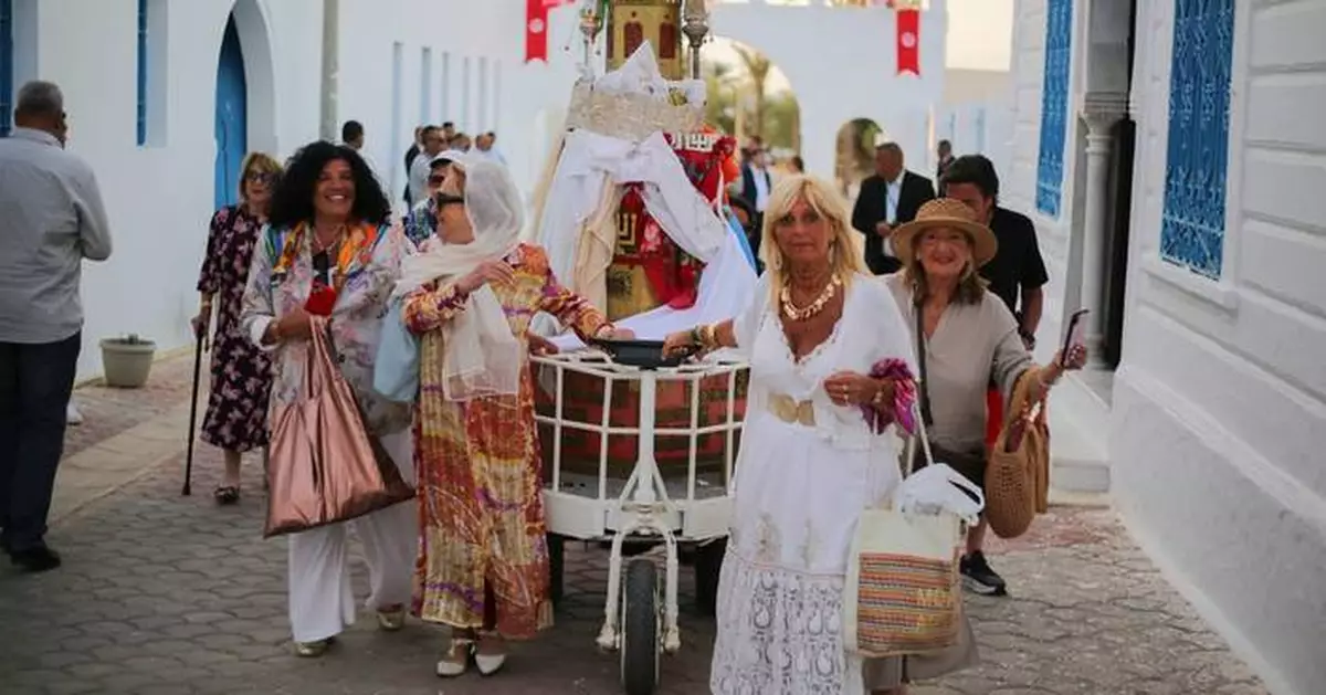 Foreign visitors return to Jewish pilgrimage in Tunisia under tight security