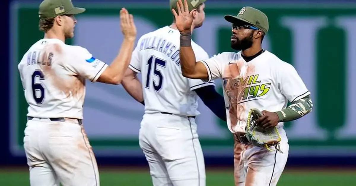 Mullins homers and has 3 singles to help AL East-leading Rays beat Marlins 7-2