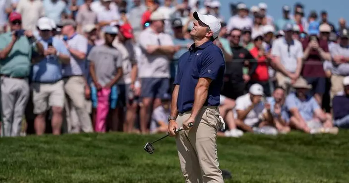 McIlroy has angry exchange with fan at PGA. Rahm, Smith, Schauffele also fade