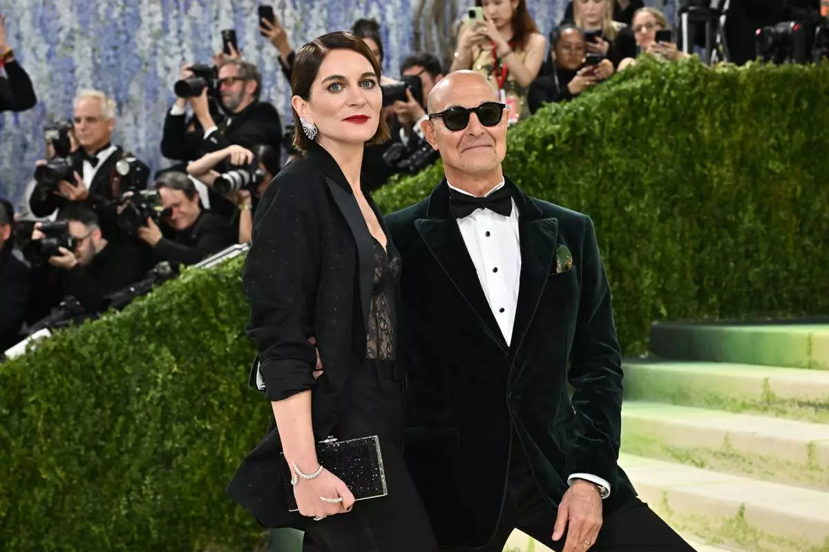 Felicity Blunt, left, and Stanley Tucci arrive at The Metropolitan Museum of Art's Costume Institute benefit gala celebrating the opening of the "Costume Art" exhibition on Monday, May 4, 2026, in New York. (Photo by Evan Agostini/Invision/AP)