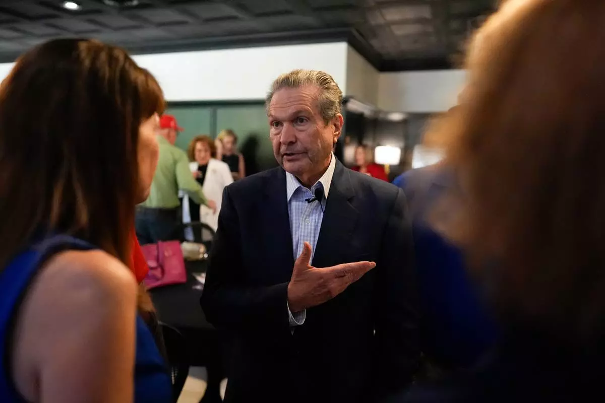 Republican gubernatorial candidate Rick Jackson speaks to voters during a campaign stop, Wednesday, May 13, 2026, in Hiram, Ga. (AP Photo/Mike Stewart)