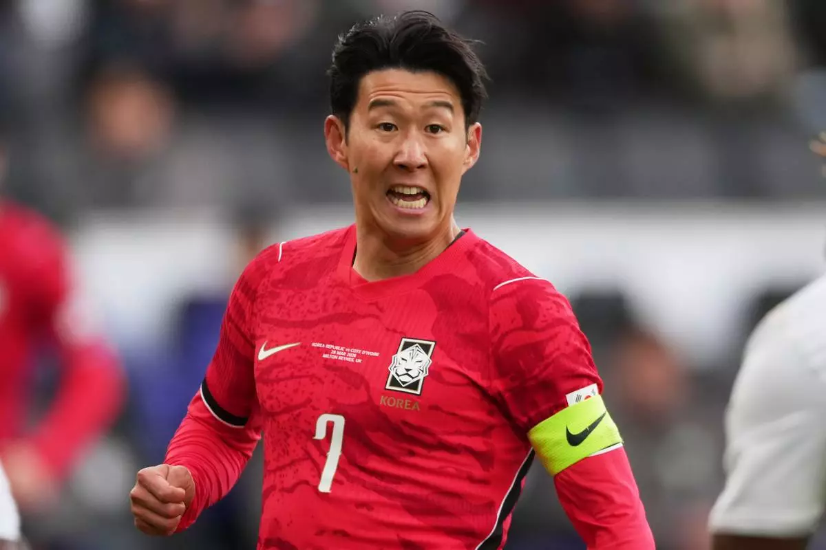 FILE -South Korea's Son Heung-min goes for the ball during the international friendly soccer match between South Korea and Ivory Coast in Milton Keynes, England, Saturday, March 28, 2026. (AP Photo/Dave Shopland, File)