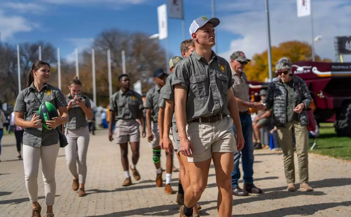 FILE - Farmers visit the Nampo agricultural fair, one of the largest in the southern hemisphere, near Bothaville, South Africa, May 15, 2025. (AP Photo/Jerome Delay)