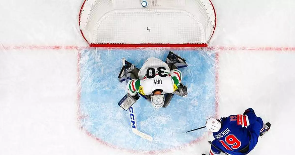 US beats Hungary to stay alive for ice hockey world quarterfinals