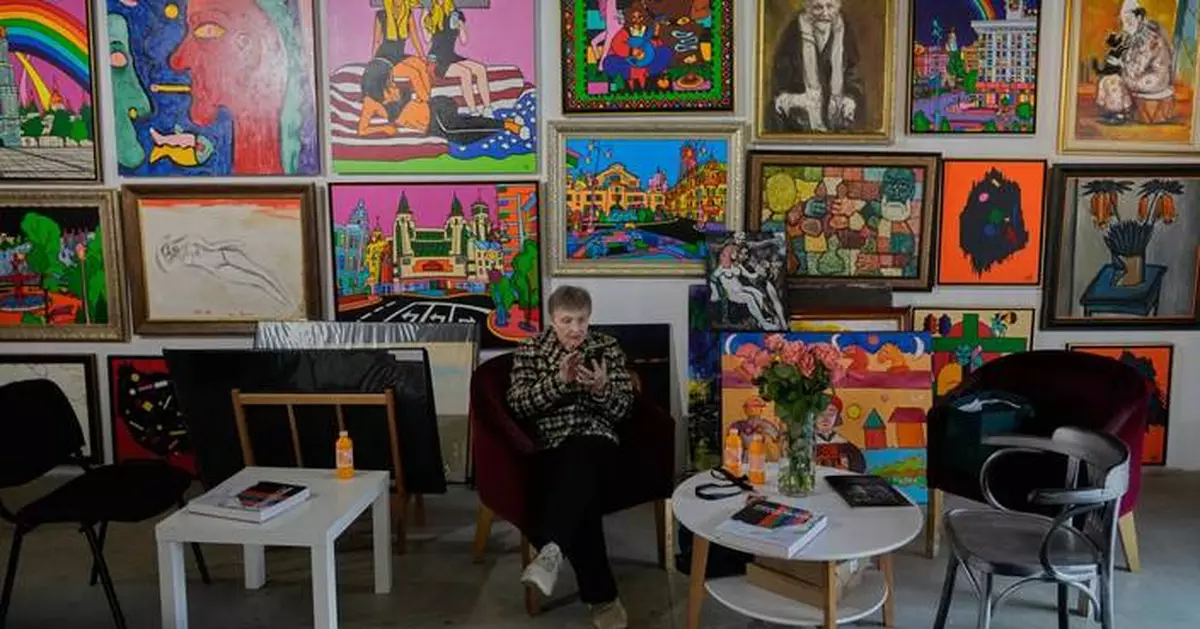 Ukrainians seeking cultural escape from war’s brutality find comfort and resilience at Kyiv art fair