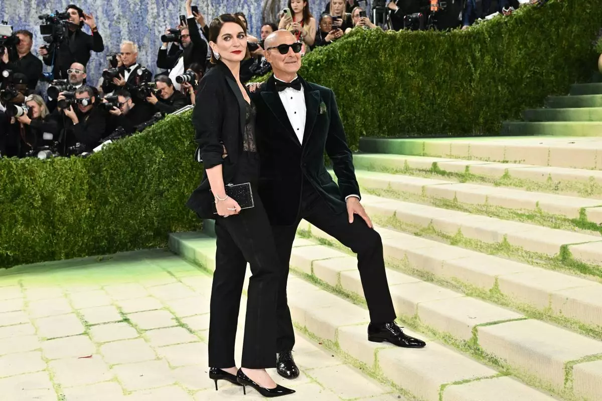 Felicity Blunt, left, and Stanley Tucci arrive at The Metropolitan Museum of Art's Costume Institute benefit gala celebrating the opening of the "Costume Art" exhibition on Monday, May 4, 2026, in New York. (Photo by Evan Agostini/Invision/AP)
