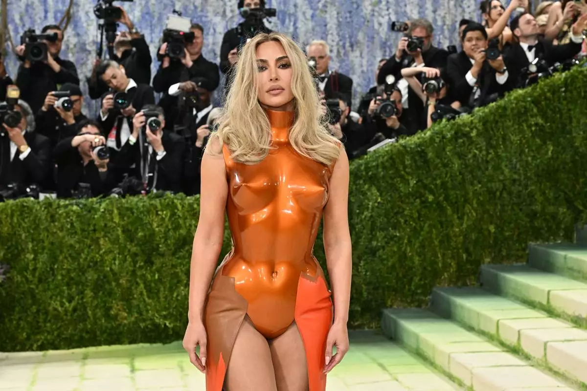 Kim Kardashian arrives at The Metropolitan Museum of Art's Costume Institute benefit gala celebrating the opening of the "Costume Art" exhibition on Monday, May 4, 2026, in New York. (Photo by Evan Agostini/Invision/AP)
