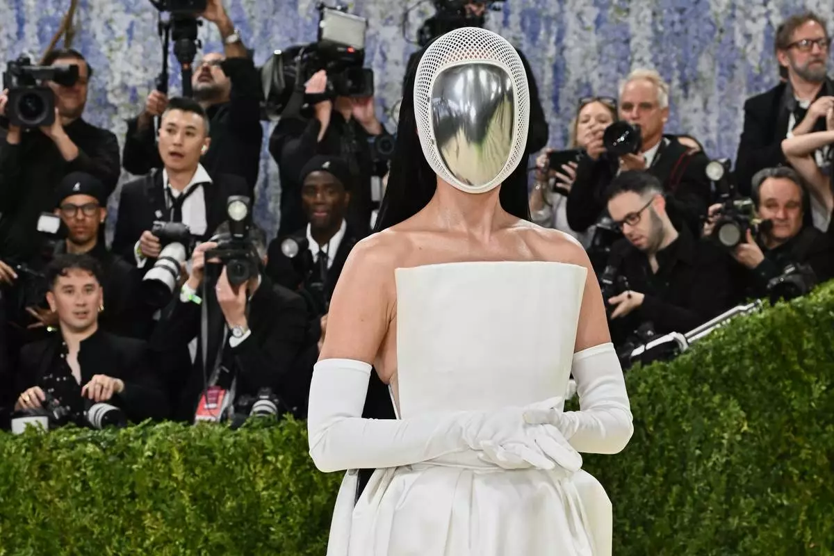 Katy Perry arrives at The Metropolitan Museum of Art's Costume Institute benefit gala celebrating the opening of the "Costume Art" exhibition on Monday, May 4, 2026, in New York. (Photo by Evan Agostini/Invision/AP) Correction: Corrects name from Hugh Jackman, Sutton Foster to Katy Perry