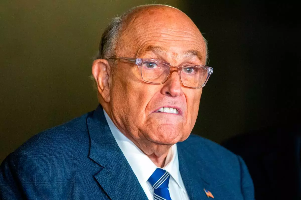 FILE - Rudy Giuliani speaks to the media outside Manhattan federal court in New York, Jan. 3, 2025. (AP Photo/Ted Shaffrey, file)