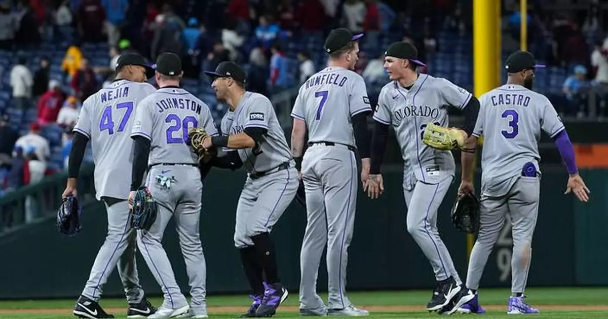 Troy Johnston has go-ahead hit in 11th as Rockies beat Phillies 9-7