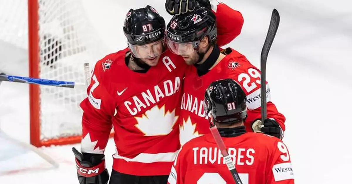 Canada beats Denmark and Crosby tallies 4 assists in third-period surge at hockey worlds
