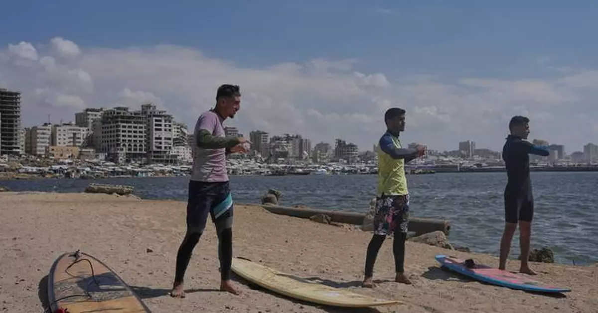 Surfers in war-torn Gaza find rare moments of joy taking to the waves