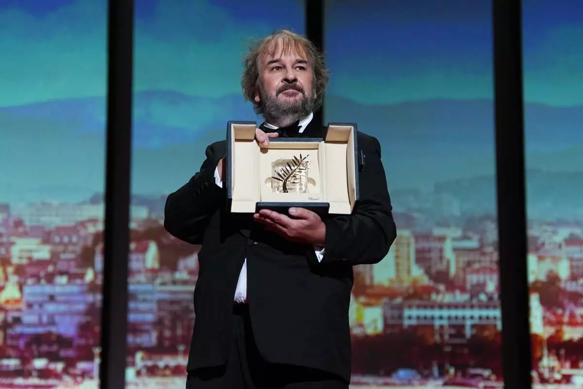 Director Peter Jackson, recipient of the honorary Palme d'Or, poses for photographers during the opening ceremony of the 79th international film festival, Cannes, southern France, Tuesday, May 12, 2026. (Photo by Scott A Garfitt/Invision/AP)