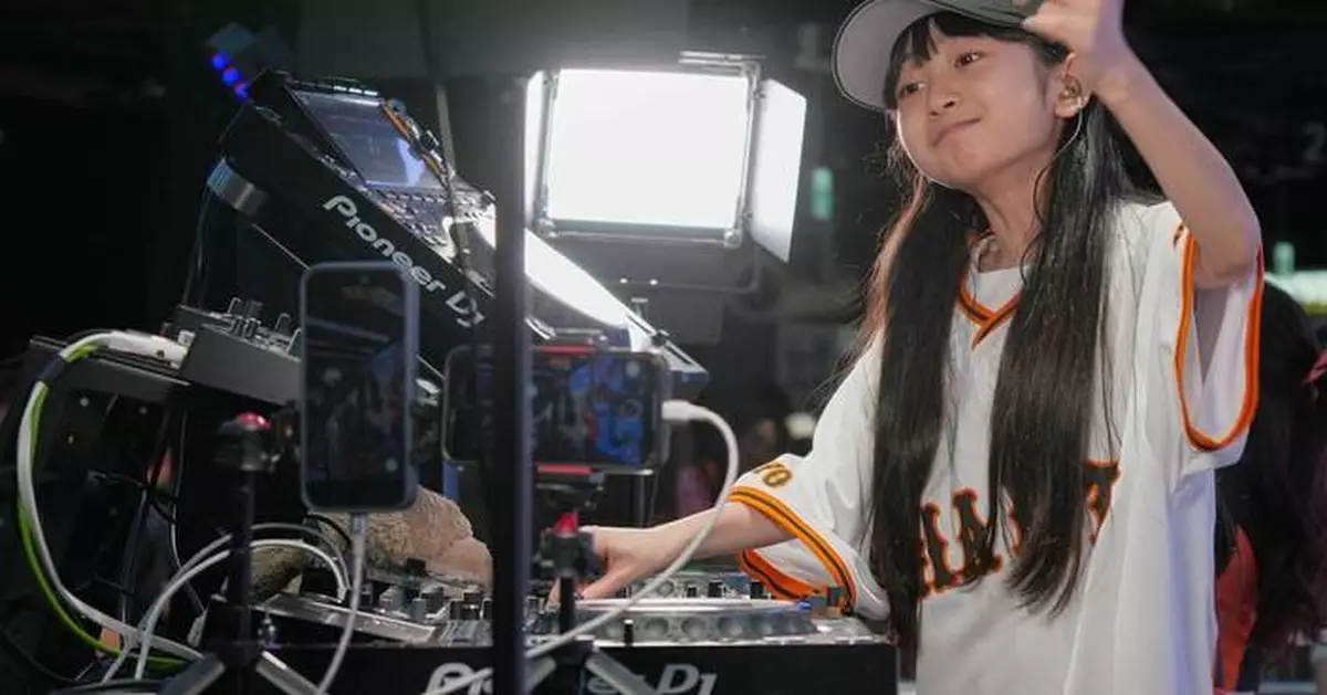 Japan's DJ Rinoka bobs to the beat as a child prodigy techno artist