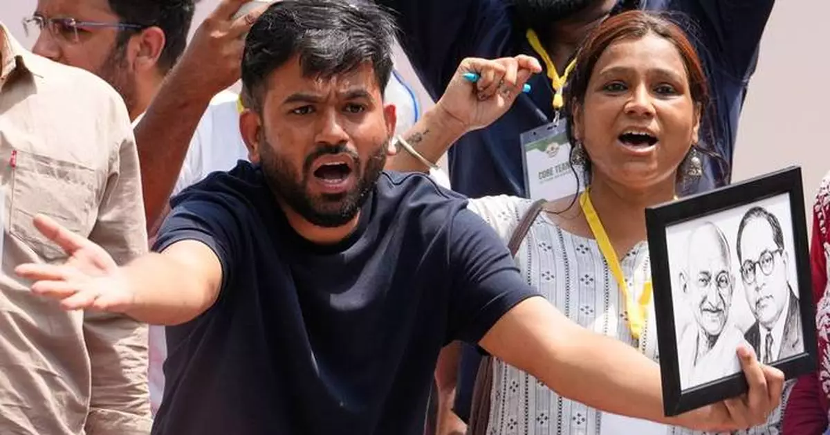 India's Cockroach Party supporters bang plates to call for education minister's resignation