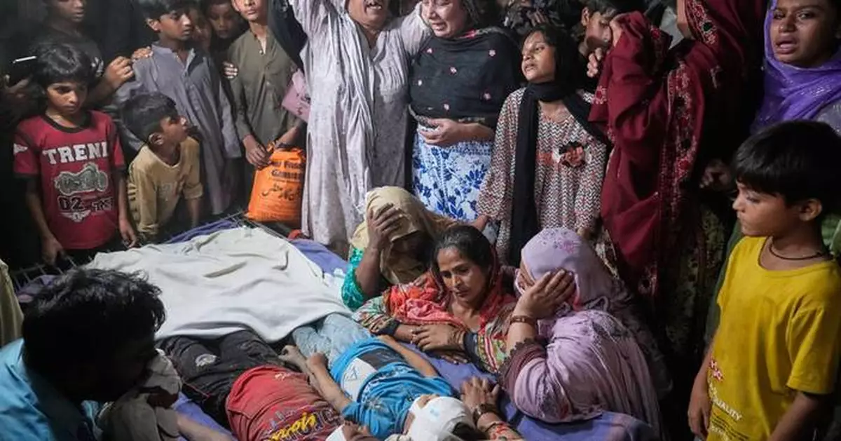 Roof of tutoring center collapses in eastern Pakistan, killing at least 14 children, police say