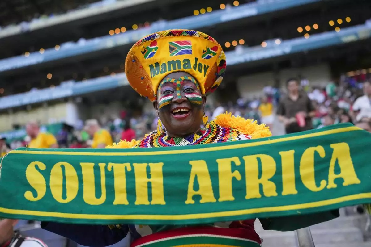 South African soccer fan Mama Joy cheers ahead of the World Cup Group A soccer match between South Africa and South Korea in Guadalupe, near Monterrey, Mexico, Wednesday, June 24, 2026. (AP Photo/Matias Delacroix)
