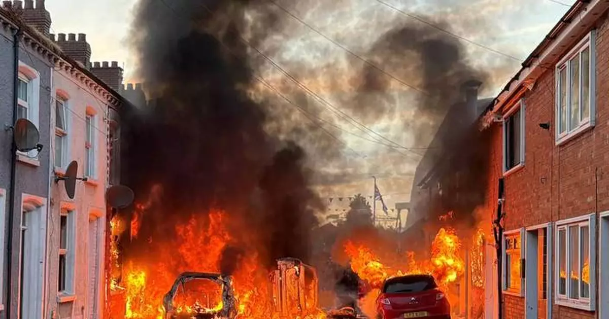 Police blast water cannons at Belfast protesters as unrest flares again after stabbing