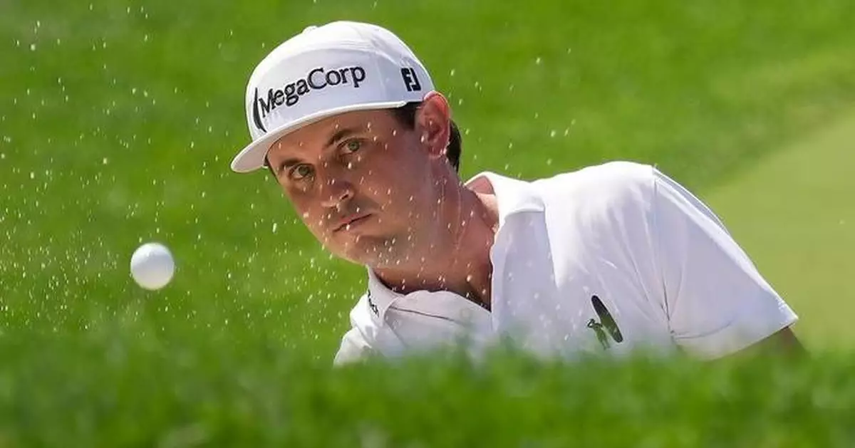 J.T. Poston handles the wind at Memorial for low round of tournament and the lead