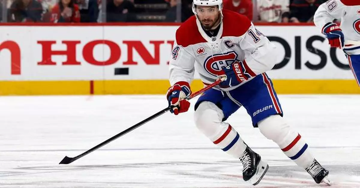 Montreal Canadiens captain Nick Suzuki wins Selke Trophy, teammate Cole Caufield takes Lady Byng