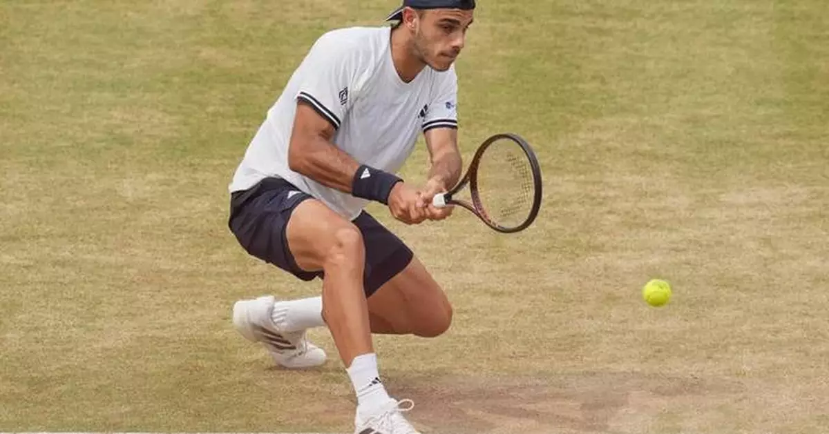 Francisco Cerundolo beats former champion Tommy Paul on grass to win Queen's final