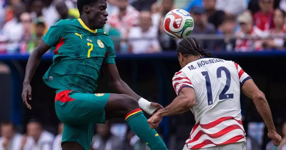 Now watch this: US coach Mauricio Pochettino turns to laptop in-game during match with Senegal