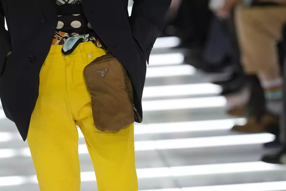 A model wears a creation from Prada's Spring/Summer 2027 men's collection presented in Milan, Italy, Sunday, June 21, 2026. (AP Photo/Luca Bruno)