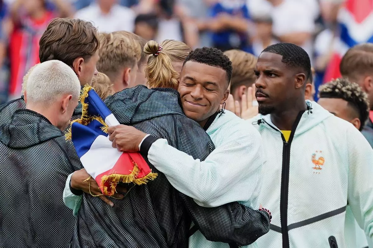 France's Kylian Mbappe and Norway's Erling Haaland, left, greet each other before the World Cup Group I soccer match between Norway and France in Foxborough, Mass., near Boston, Friday, June 26, 2026. (AP Photo/Martin Meissner)