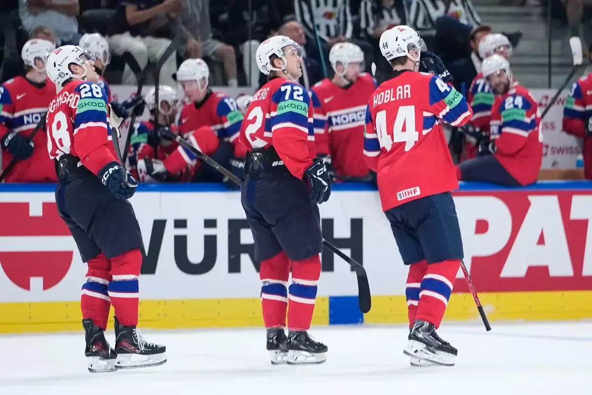 Norway's Stian Solberg (72) celebrates after scoring his side's second goal during the 2026 IIHF Men's Ice Hockey World Championship bronze medal match between Canada and Norway, in Zurich, Switzerland, Sunday, May 31, 2026. (AP Photo/Darko Bandic)