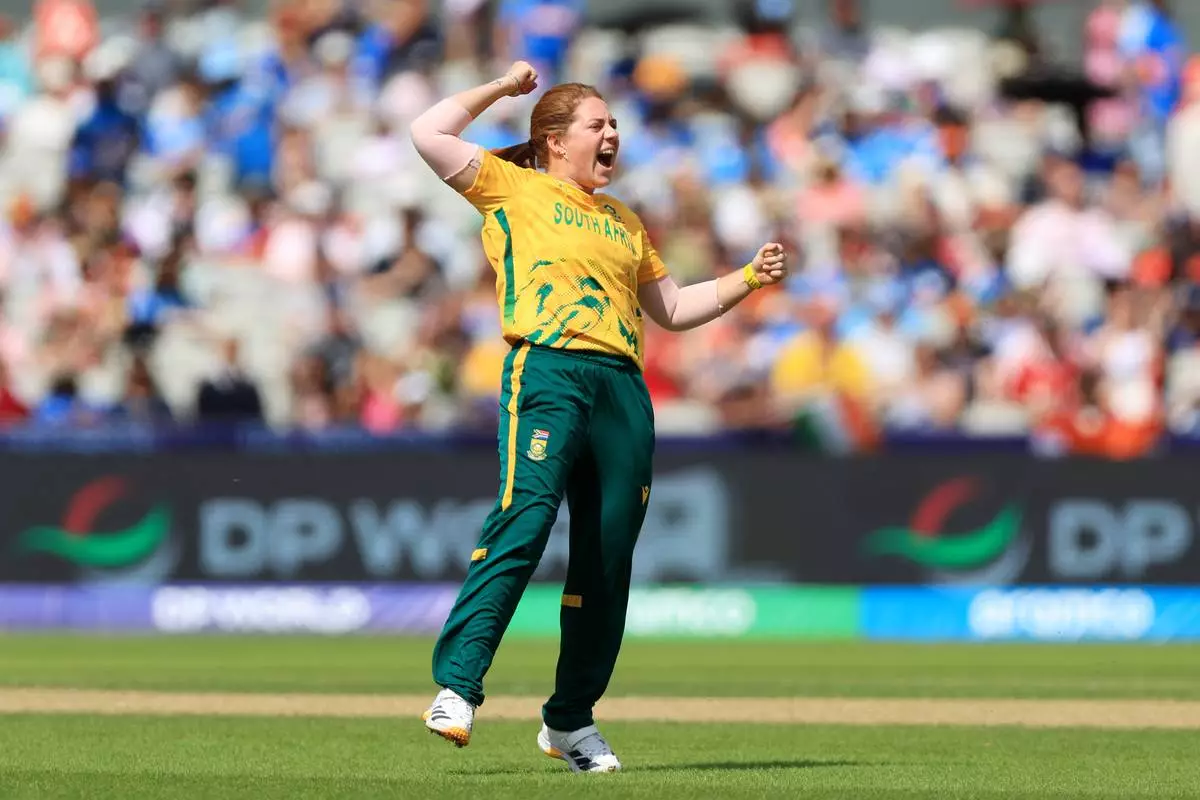 South Africa's Nadine de Klerk celebrates taking the wicket of India's Jemimah Rodrigues during the ICC Women's T20 World Cup match between India and South Africa, at Emirates Old Trafford, Manchester, England, Sunday June 21, 2026. (Nigel French/PA via AP)