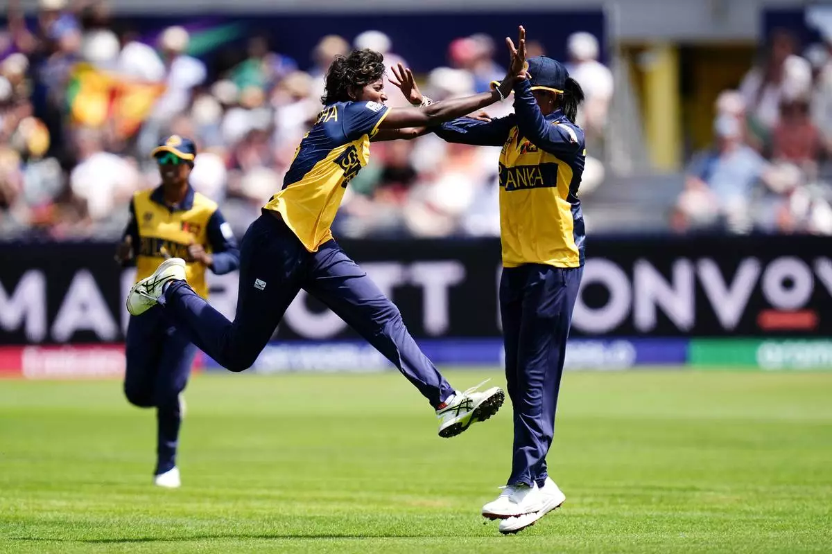 Sri Lanka's Kaveesha Dilhari celebrates bowling out West Indies' Chinelle Henry during the ICC Women's T20 World Cup match between Sri Lanka and West Indies, in Manchester, England, Sunday, June 21, 2026. ( Jacob King/PA via AP)