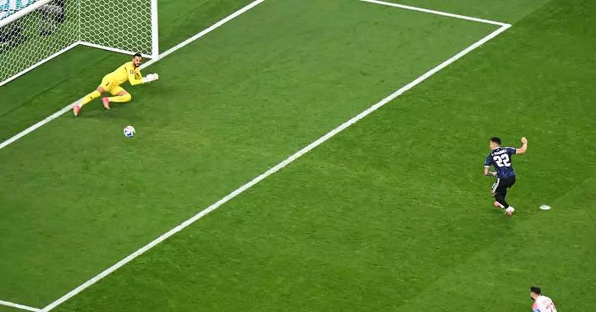 Messi subs in and scores again as defending World Cup champ Argentina beats Jordan to sweep group