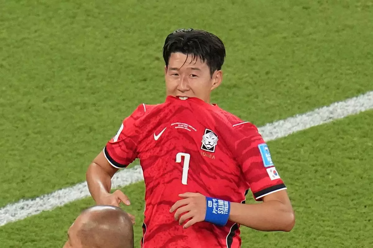 South Korea's Son Heung-min (7) reacts after his team lost the World Cup Group A soccer match against South Africa in Guadalupe, near Monterrey, Mexico, Wednesday, June 24, 2026. (AP Photo/Dolores Ochoa)