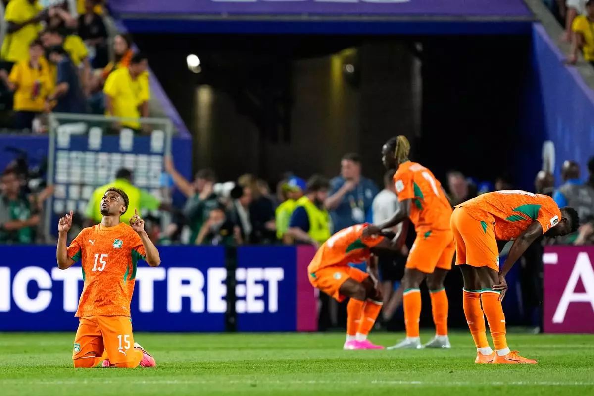 Ivory Coast's Amad Diallo (15) reacts with teammates following their World Cup Group E soccer match win over Ecuador in Philadelphia, Sunday, June 14, 2026. (AP Photo/Petr David Josek)