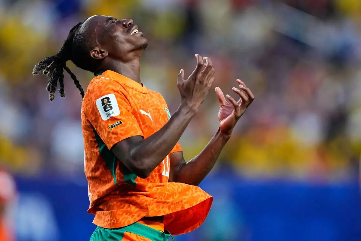 Ivory Coast's Yan Diomande (11) reacts during the World Cup Group E soccer match between Ivory Coast and Ecuador in Philadelphia, Sunday, June 14, 2026. (AP Photo/Petr David Josek)