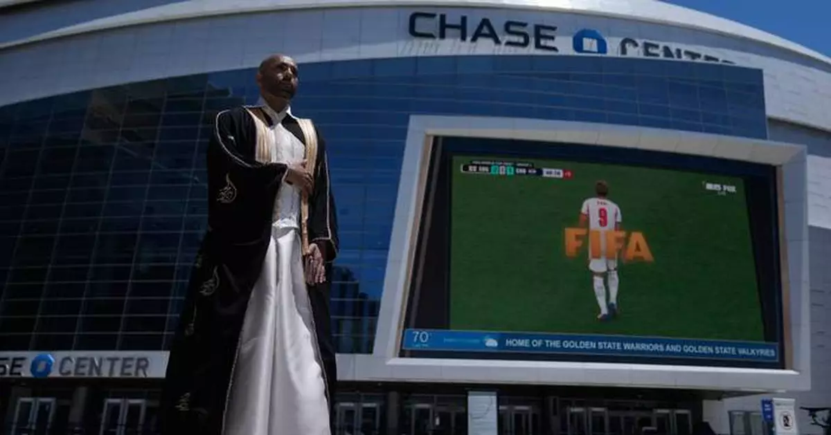 In a rainbow-trimmed robe at the World Cup, a gay Qatari doctor advocates for equal rights