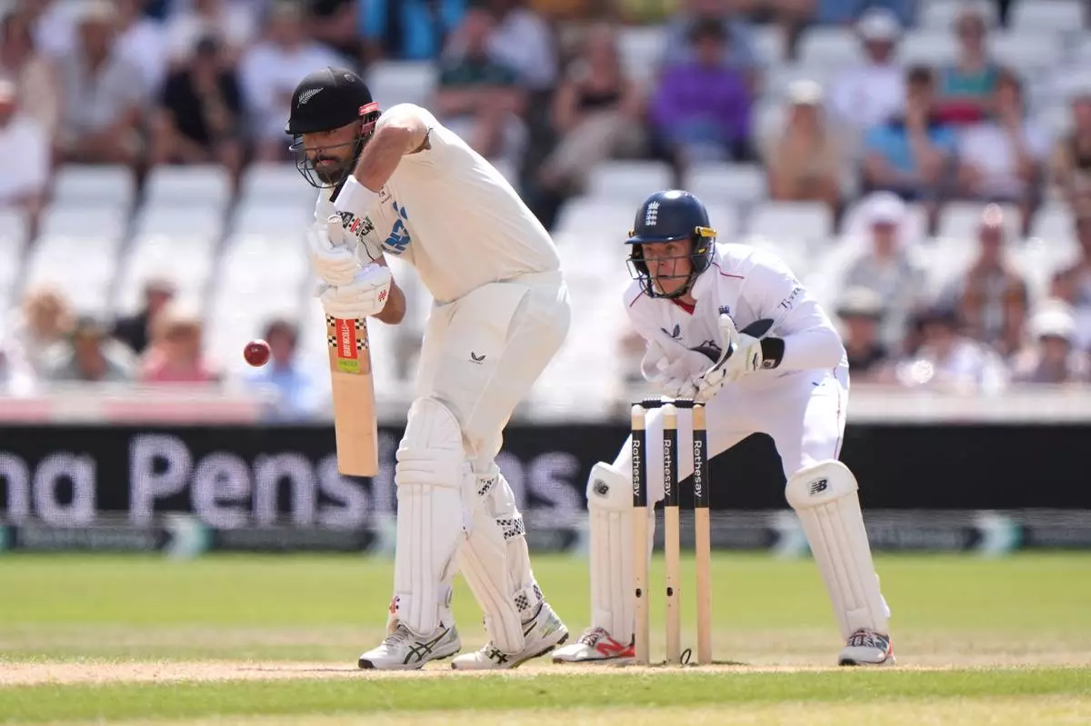 New Zealand's Daryl Mitchell bats, on day four of the Third Test cricket match between England and New Zealand, in Nottingham, England, Sunday June 28, 2026. (Joe Giddens/PA via AP)