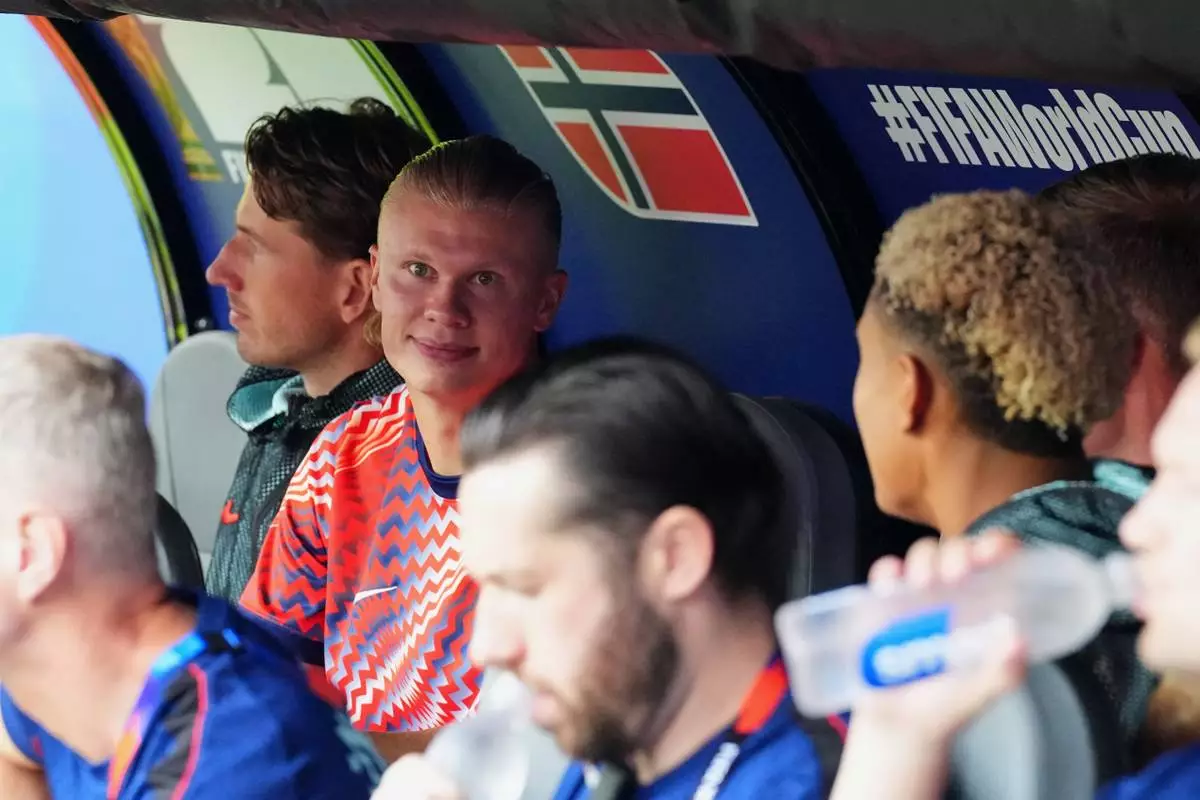 Norway's Erling Haaland sits on the bench during the World Cup Group I soccer match between Norway and France in Foxborough, Mass., near Boston, Friday, June 26, 2026. (AP Photo/Martin Meissner)