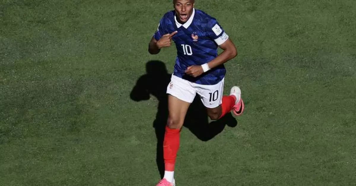 France striker Kylian Mbappé scores his 13th and 14th World Cup goals