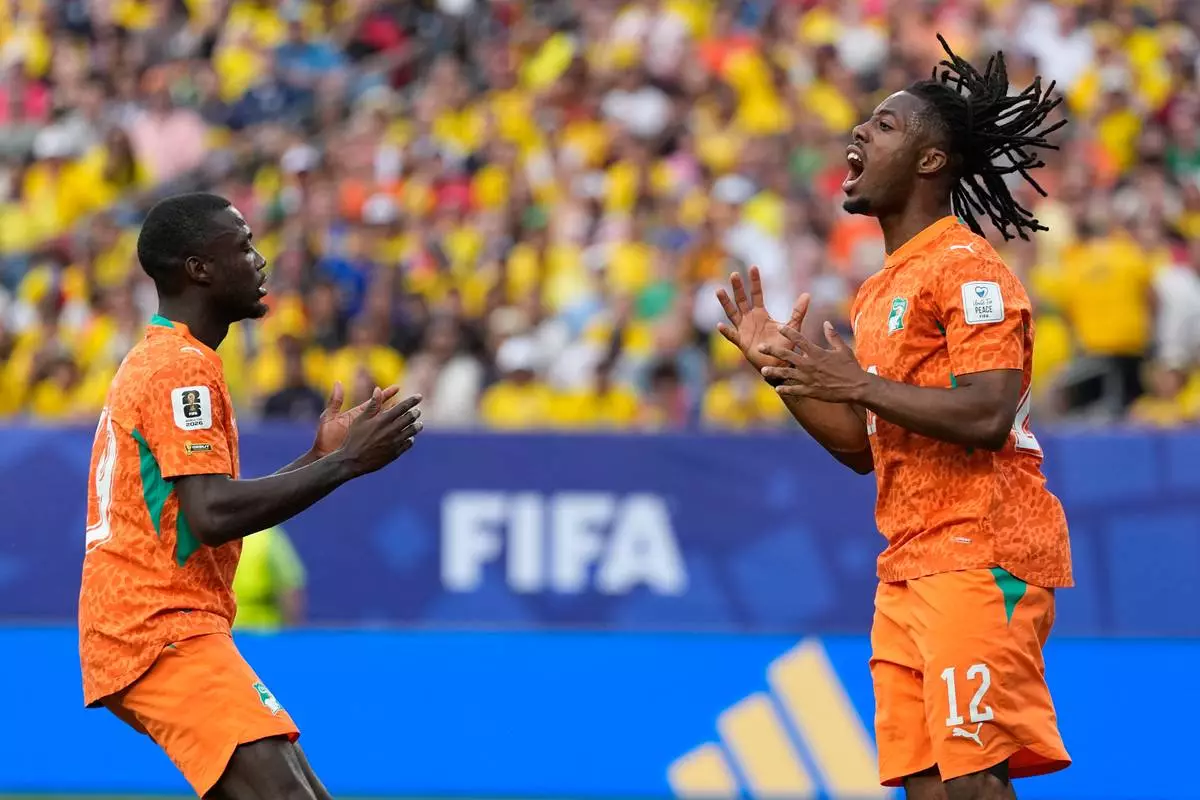 Ivory Coast's Elye Wahi, right, reacts after missing a chance to score against Ecuador during a World Cup Group E soccer match in Philadelphia, Sunday, June 14, 2026. (AP Photo/Matt Slocum)